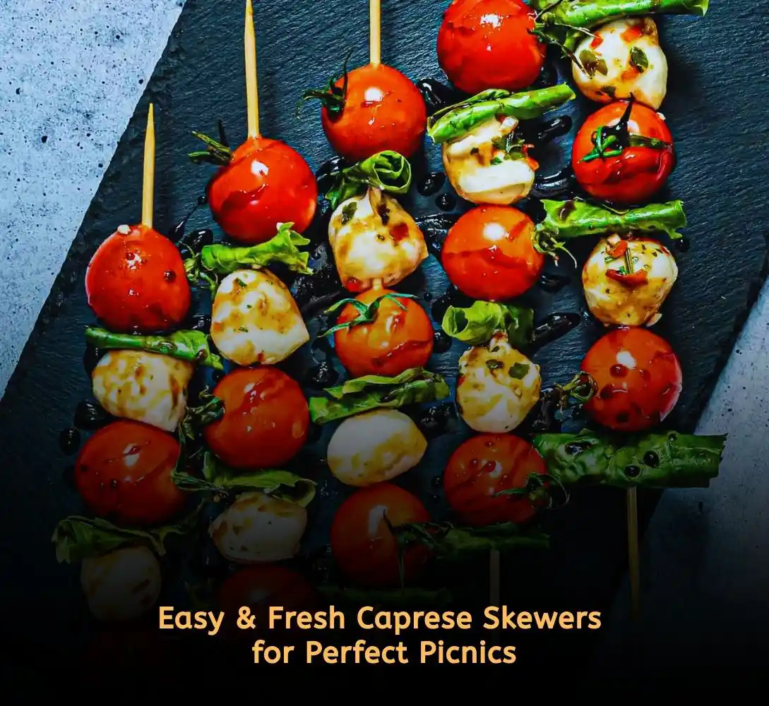 Caprese skewers with cherry tomatoes, mozzarella, and basil for easy picnic food ideas