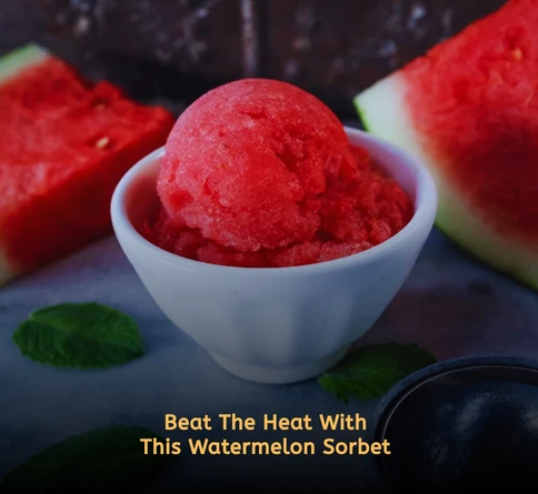 Refreshing watermelon mint sorbet in a chilled bowl with fresh mint leaves and lime slices on a bright summer table