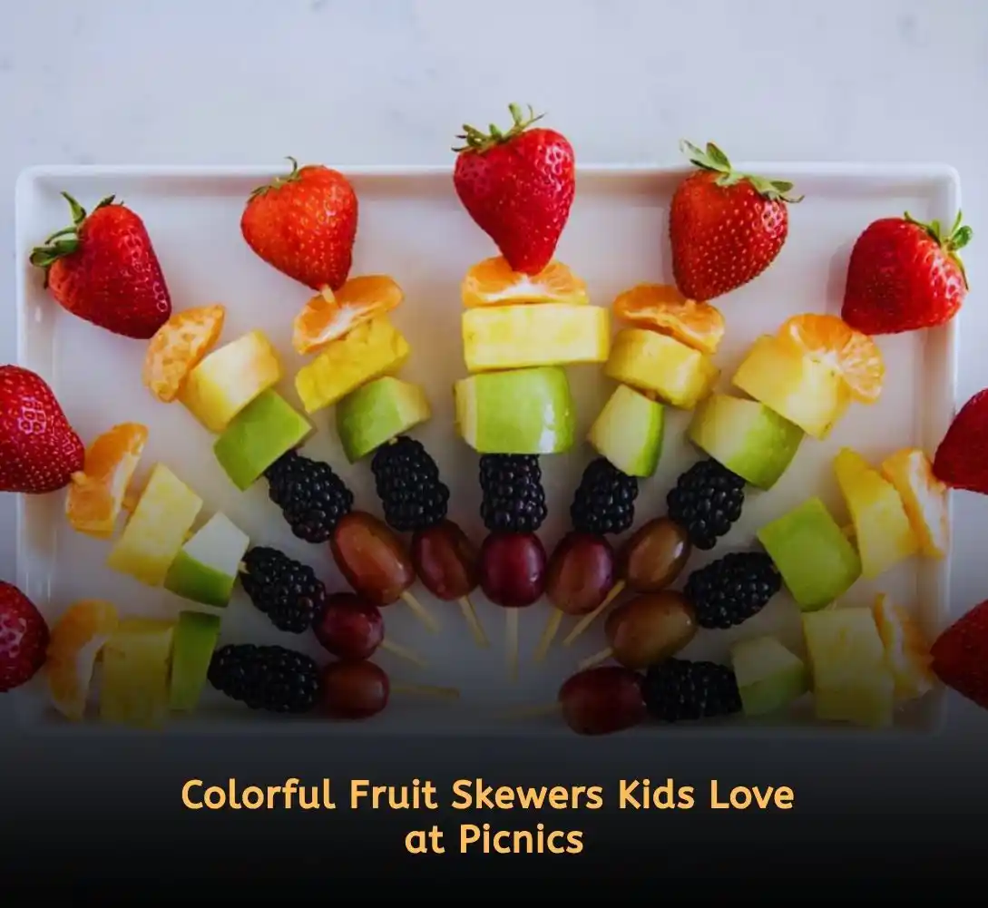 Fresh fruit skewers with strawberries, grapes, and pineapple for picnic ideas