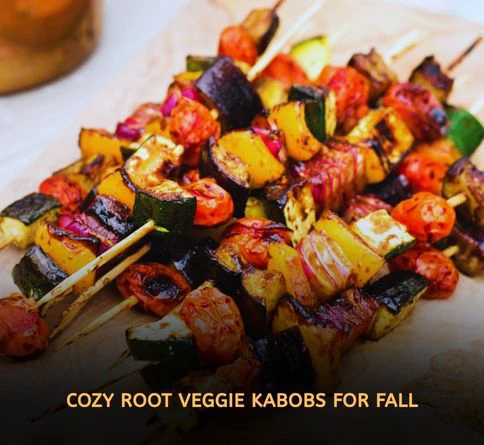 Grilled sweet potato carrot and onion kabobs cooking over medium heat barbecue