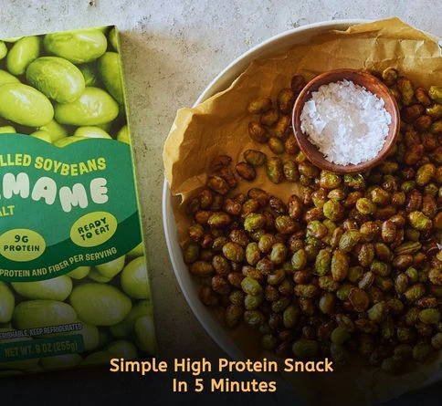 Warm edamame pods sprinkled with sea salt in a bowl for a healthy protein snack
