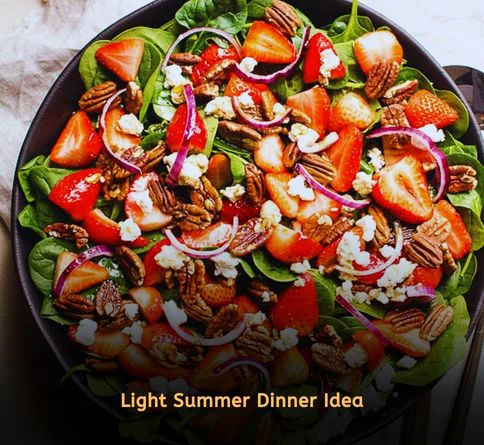 Strawberry spinach salad with turkey goat cheese and pecans as a refreshing summer dinner recipe