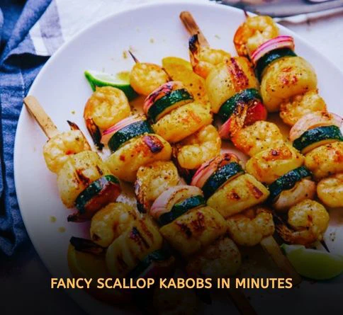 Lime scallop skewers grilling over high heat with golden seared edges