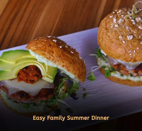 Turkey burger sliders with pesto and melted cheese served as a summer dinner recipe for family meals