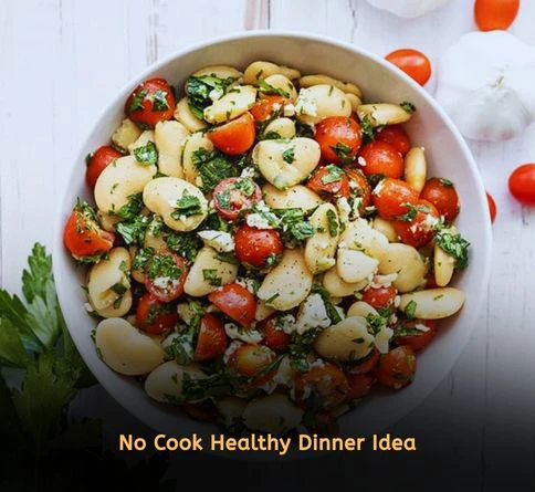 Mediterranean white bean salad with cucumber sundried tomatoes and lemon dressing as summer dinner recipe