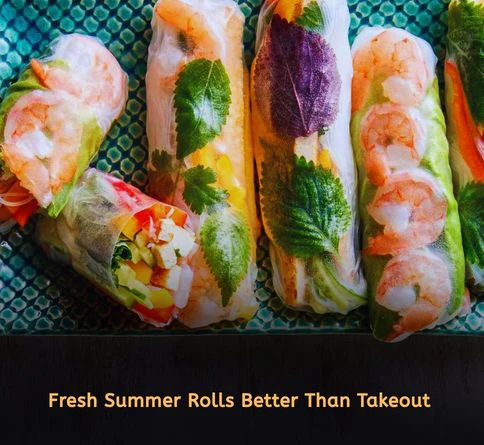 Vietnamese summer rolls with shrimp, herbs, and rice noodles served with peanut sauce