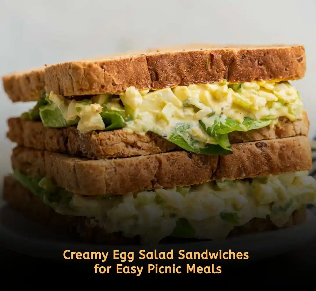 Egg salad sandwiches stacked for easy picnic food ideas and outdoor lunches