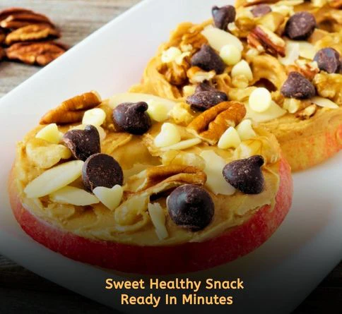Fresh apple slices topped with almond butter and cinnamon for a quick healthy sweet snack