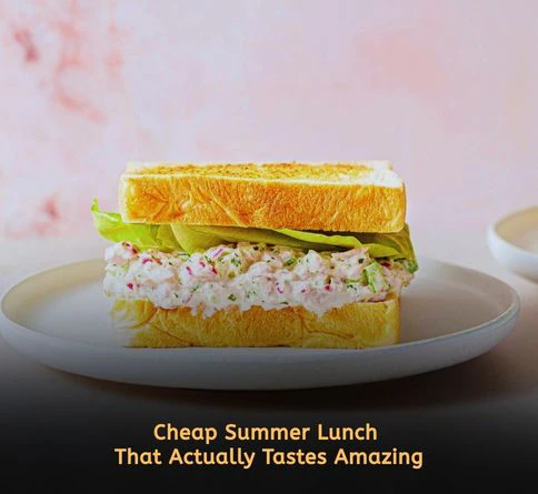 Classic tuna salad sandwich with celery and whole wheat bread served on a plate for budget summer lunch ideas