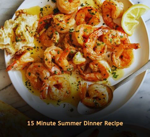 Lemon garlic butter shrimp cooked in skillet served as a quick and easy summer dinner recipe