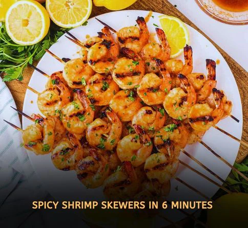Spicy garlic shrimp skewers sizzling on grill with smoky char and melted butter glaze