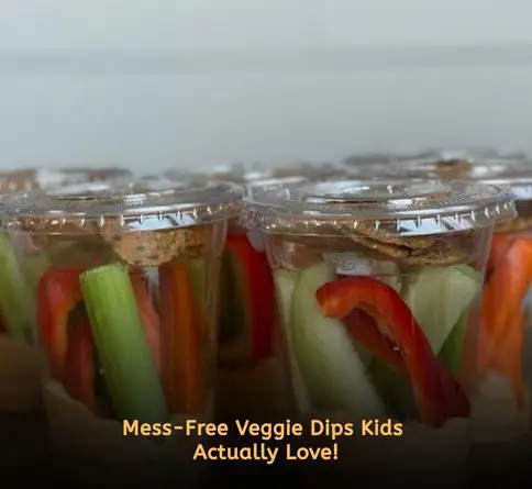 Veggie sticks served in hummus cups for healthy kids picnic snack idea.