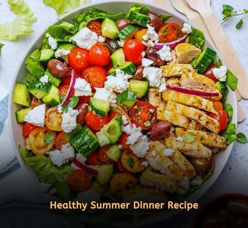 Greek chicken salad with cucumbers olives feta cheese and fresh vegetables for a healthy summer dinner meal