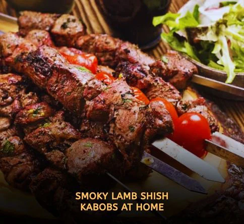 Mediterranean lamb kabobs with rosemary and garlic cooking over charcoal grill