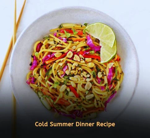 Cold peanut noodle salad with carrots and crushed peanuts served chilled as a summer dinner recipe