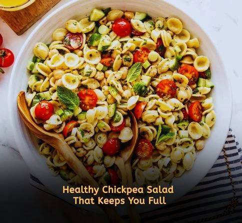 Mediterranean chickpea salad with bell peppers, parsley, red onion, and lemon dressing