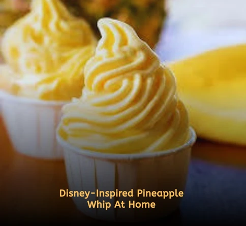 Smooth pineapple whip soft serve in a dessert cup with tropical pineapple garnish