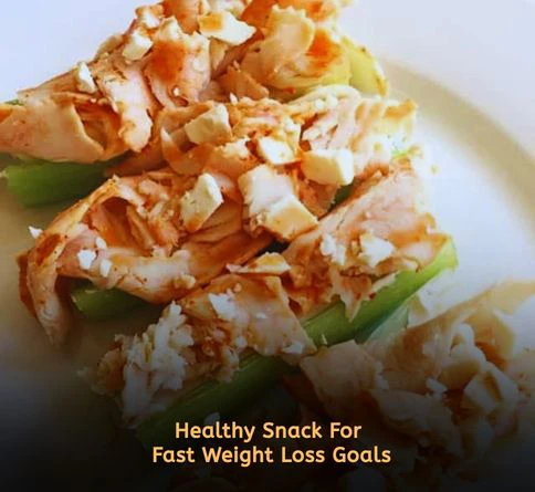 Celery sticks stuffed with creamy chicken salad for a healthy low calorie snack recipe
