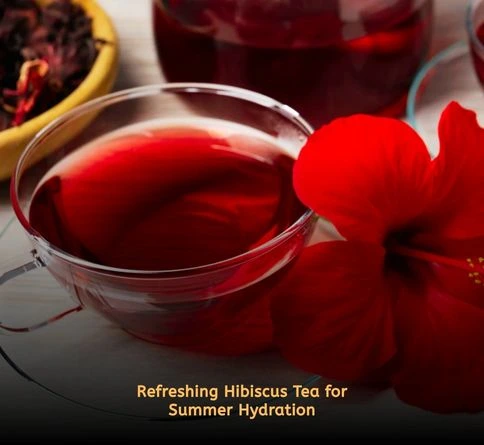 Glass of iced hibiscus tea with lemon slice on a bright summer table