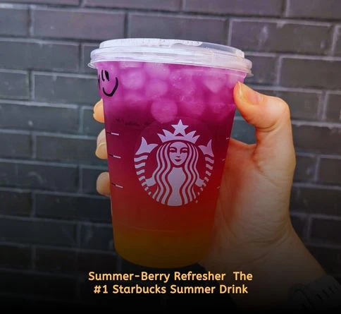 Summer-Berry Refresher with blueberry and blackberry flavors, popping pearls, ice cubes, and vibrant blue-purple color in a clear Starbucks-style cup