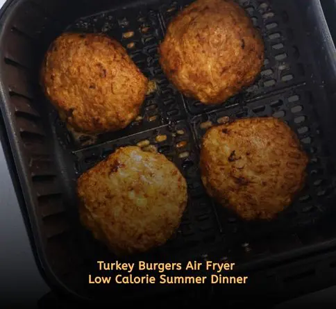 Air fryer turkey burger served with lettuce and tomato for a high protein meal.