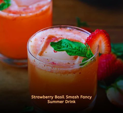 Strawberry basil cocktail with fresh herbs and ice