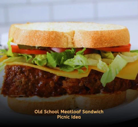 Cold meatloaf sandwich with lettuce and onion wrapped for a picnic lunch