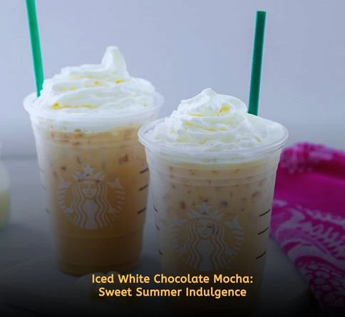 Iced White Chocolate Mocha with whipped cream, white chocolate sauce, espresso, milk, and ice