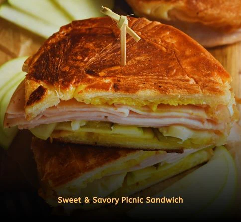 Turkey apple panini with cheddar cheese grilled until golden brown.