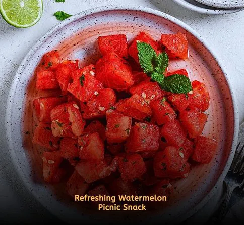 Watermelon slices with mint leaves on picnic plate