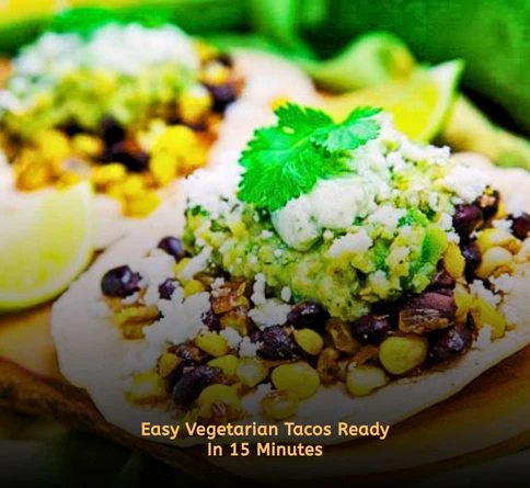 Black bean and corn tacos topped with mashed avocado on soft tortillas for a healthy summer dinner.