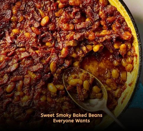 Traditional baked beans with bacon served in a rustic picnic dish