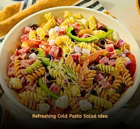 Italian pasta salad with vegetables in picnic container
