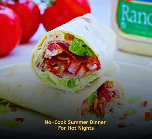BLT lettuce wraps filled with bacon, tomatoes, and creamy mayonnaise on a serving plate.