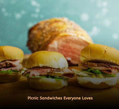 Roast beef sliders with lettuce, cheese, and brioche buns for outdoor dining.