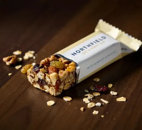 A Small Granola Bar Granola bar with oats and nuts, a portable pre-workout snack