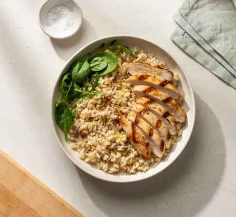 Brown Rice with Lean Protein Brown rice with grilled chicken, a steady-energy pre-workout meal