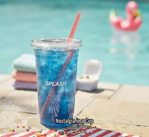 Bright blue raspberry lemonade slush in a cup with a straw