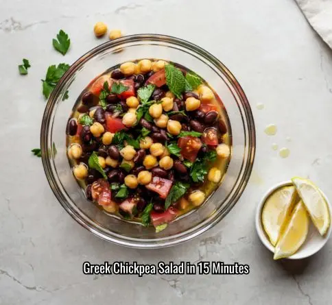 Balela style chickpea and black bean salad with tomatoes parsley and mint